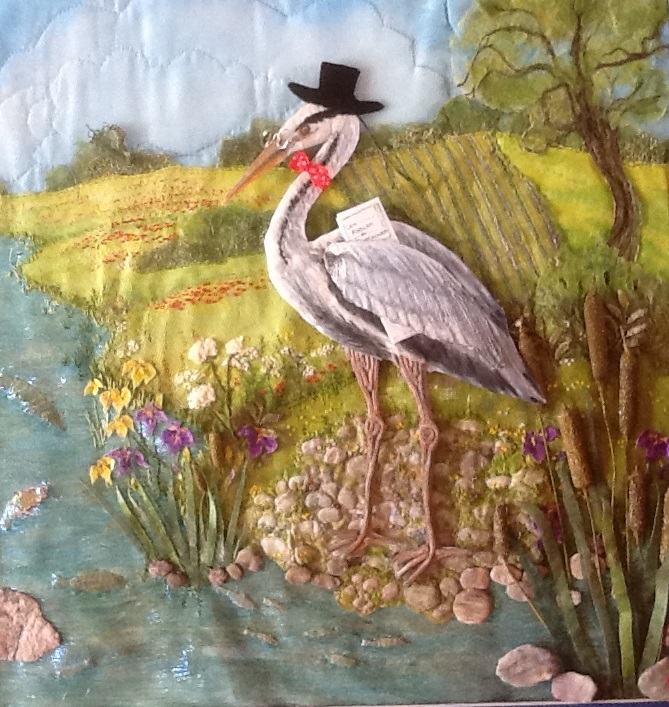 LE HERON Broderie - Broderie – 40 x 38 cm hors cadre – Différents tissus peints, découpés, puis brodés entièrement à la main, plus des perles, Œuvre créée pour le, et exposée lors du, “Mai des Arts”, Bergerac